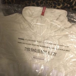 supreme quilted arc logo